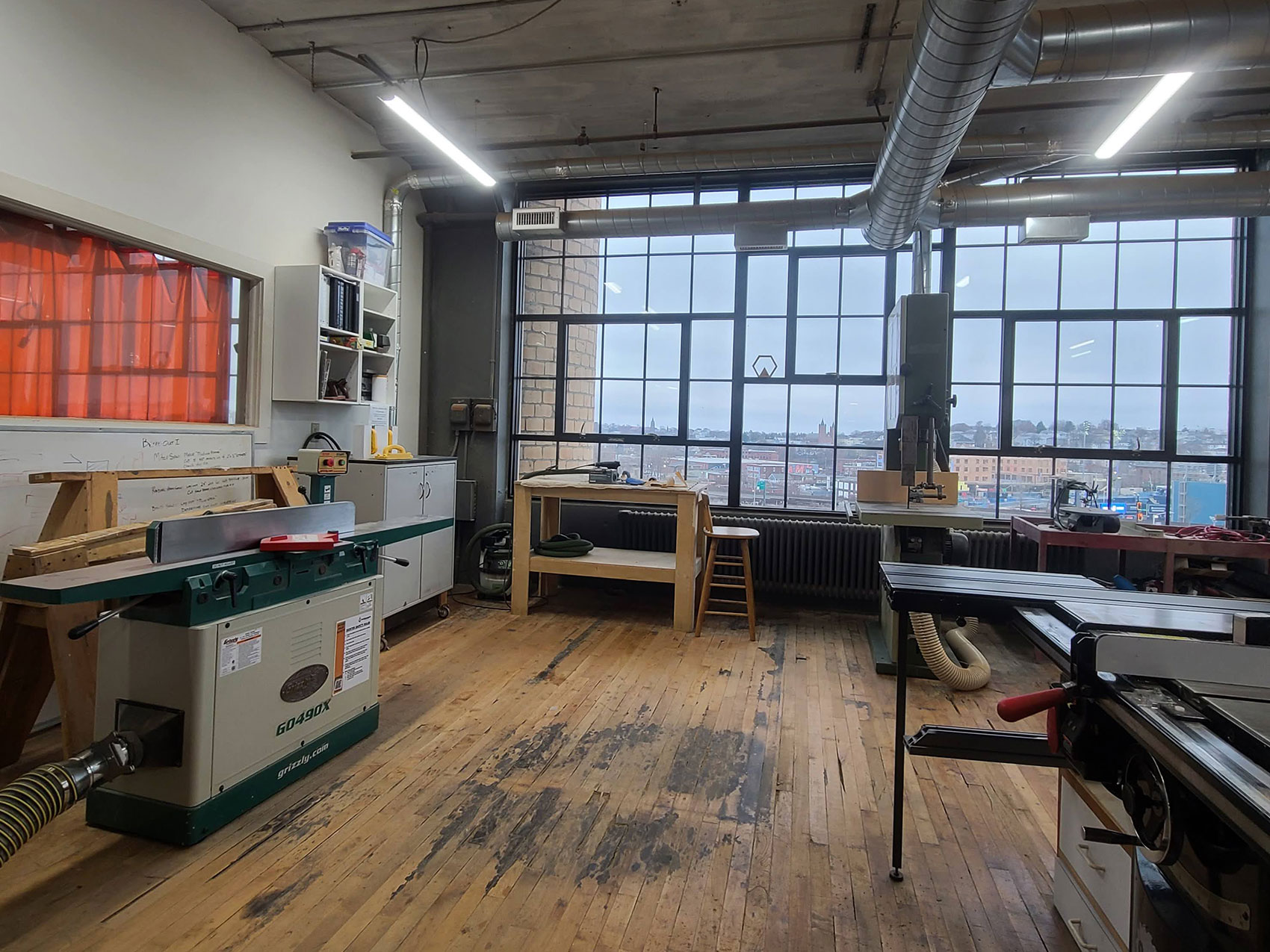 The Technocopia Wood Shop's tool set includes a joiner, an orbital sander, a band saw, a table saw and more
