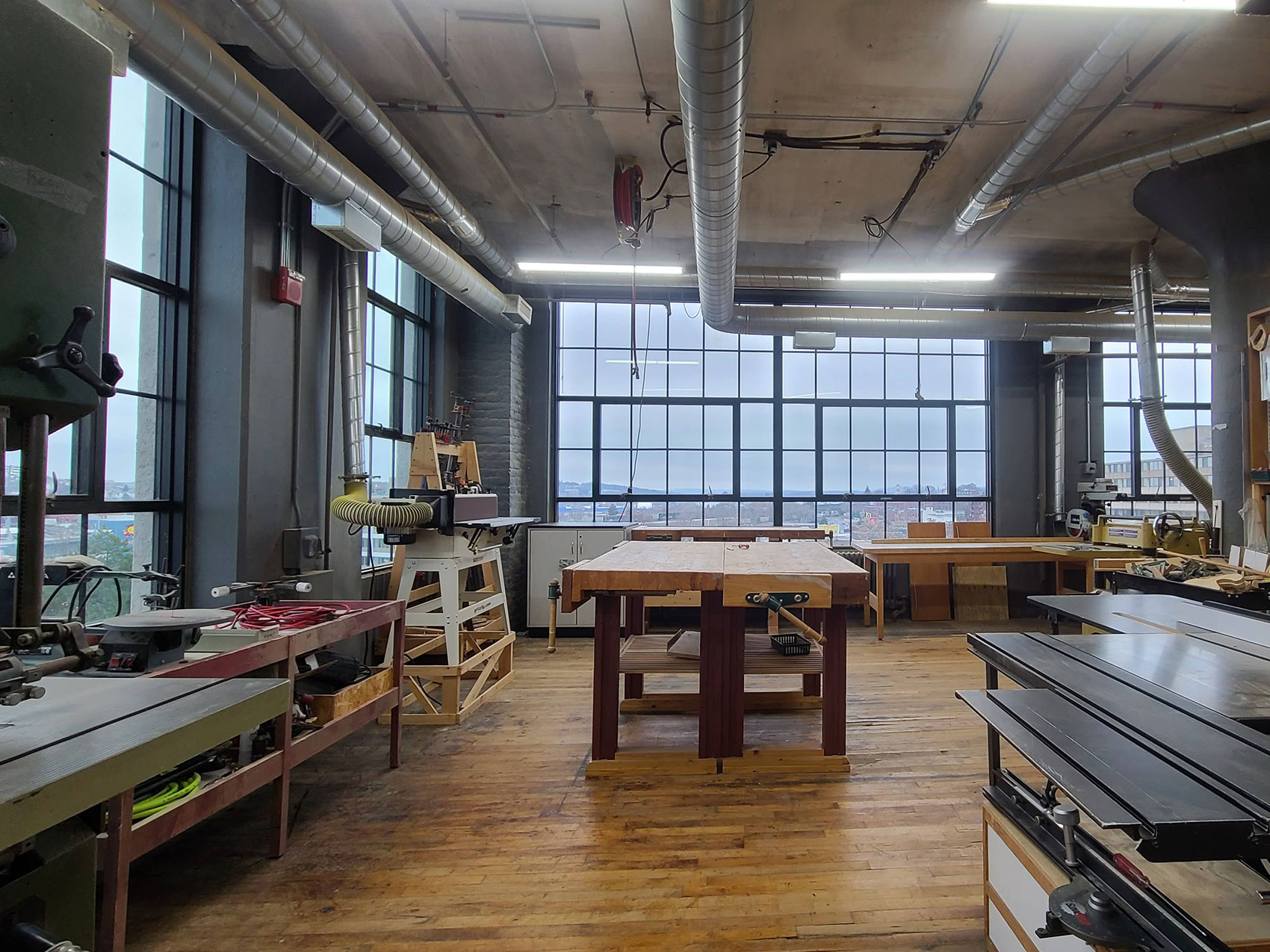 The Technocopia Wood Shop's tool set includes a joiner, a band saw, a table saw, a belt sander, a radial arm saw and more.
