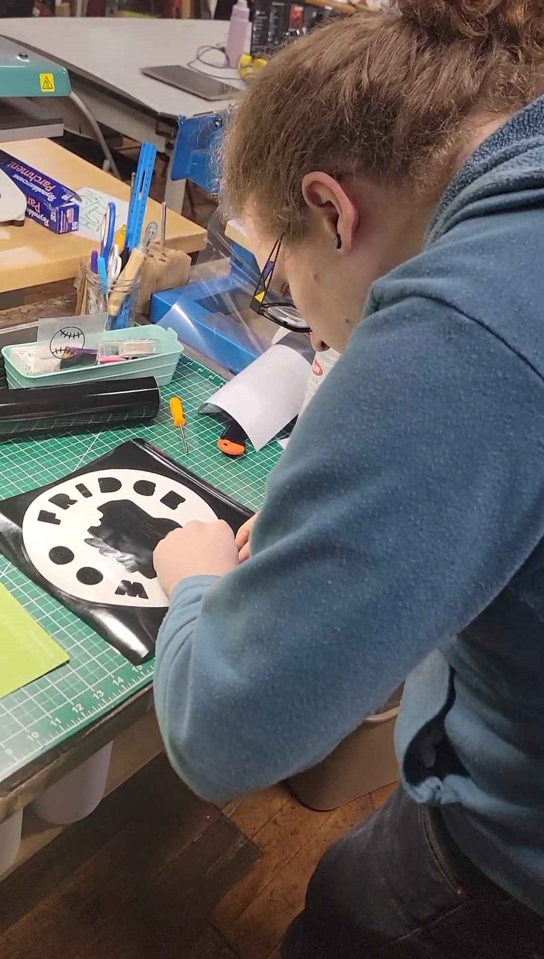 Riley working on Woo Fridge Vinyl